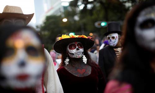 Kinh dị “bộ xương” diễu hành trong lễ hội người chết ở Mexico - Ảnh 12.
