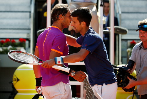 Hạ bệ Djokovic, Nadal tiến sát ngôi vương Madrid Open - Ảnh 5.