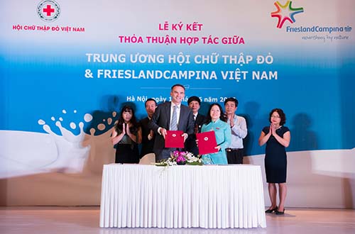 Hội Chữ thập đỏ Việt Nam và FrieslandCampina Việt Nam ký kết thỏa thuận hợp tác - Ảnh 1.