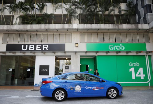 Uber về tay Grab - Ảnh 1.