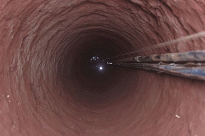 Chuyện rợn người dưới đ&aacute;y giếng s&acirc;u hoắm ở Gia Lai - Ảnh 2.