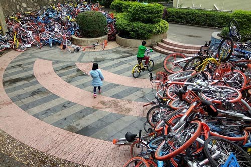 Trung Quốc: Lãng phí xe đạp chia sẻ - Ảnh 1.