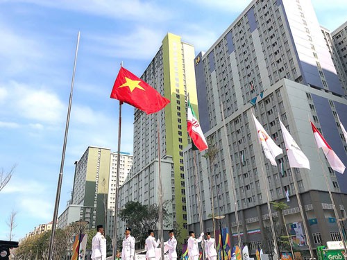 Quốc kỳ Việt Nam tung bay ở ASIAD 18 - Ảnh 1.
