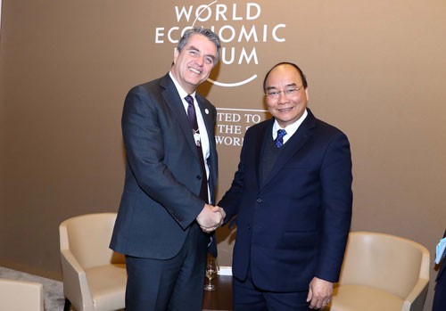 Thủ tướng Nguyễn Xuân Phúc dự WEF: Đột phá để ứng phó biến đổi khí hậu - Ảnh 1.