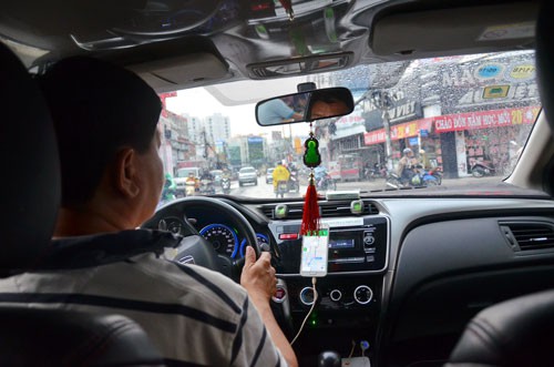 Vay mua xe chạy taxi công nghệ: Không dễ ăn - Ảnh 1.