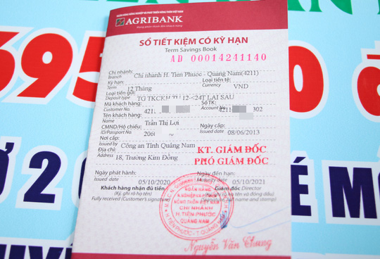 Báo Người Lao Động trao hơn 143,6 triệu đồng cho 2 cháu bé mồ côi ở Quảng Nam - Ảnh 5.