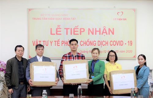 Doanh nghiệp chung tay chống dịch Covid-19 - Ảnh 1.