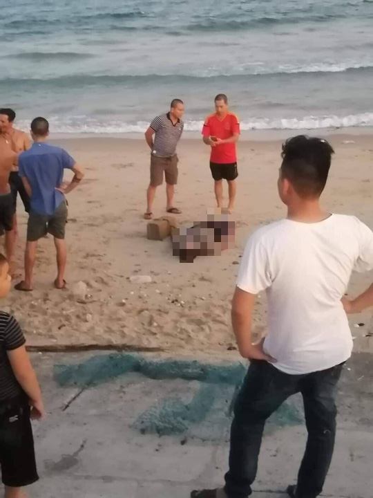 Thông tin mới vụ thi thể cột vào tảng đá dạt vào bờ biển Bình Thuận - Ảnh 1.