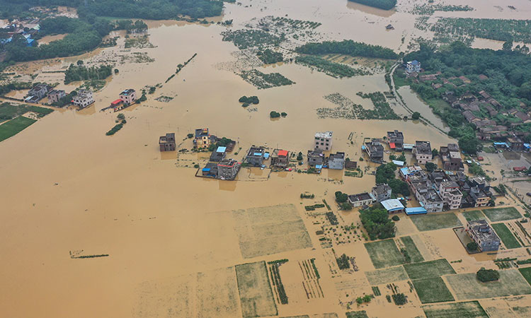 Mưa lớn không dứt, Trung Quốc nâng phản ứng lũ lụt lên mức cao thứ 2 - Ảnh 1.