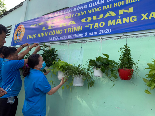 Chung tay làm đẹp môi trường sống - Ảnh 1.