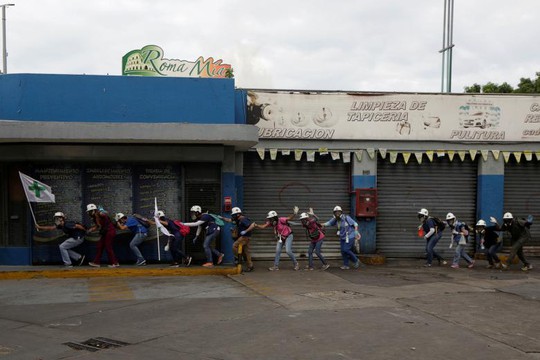 Venezuela: Bạo lực, cướp bóc gia tăng, 37 người chết - Ảnh 1.