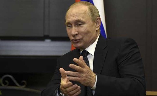 Ông Putin: “Tôi ngồi cạnh cố vấn Mỹ nhưng không nói chuyện” - Ảnh 1.