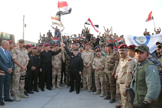 Iraq tuyên bố kết thúc cuộc chiến chống IS - Ảnh 1.