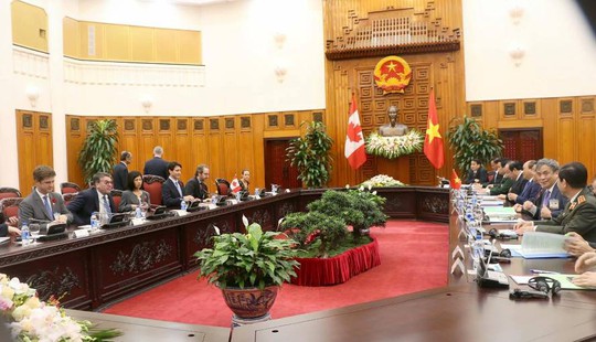 Cận cảnh lễ đón Thủ tướng Canada Justin Trudeau ở Phủ Chủ tịch - Ảnh 9.
