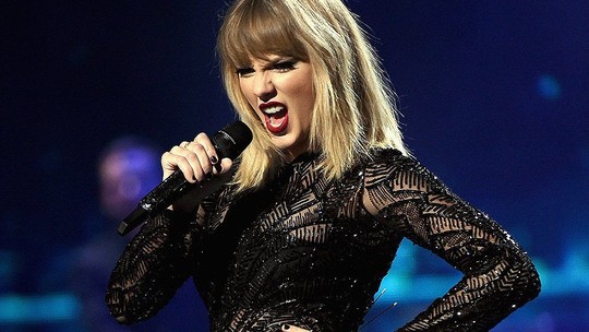 Taylor Swift giữa khen tặng và chỉ trích - Ảnh 1.