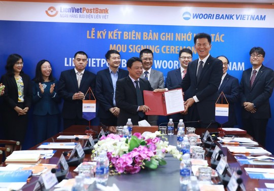 LienVietPostBank bắt tay với Woori Bank Việt Nam - Ảnh 1.