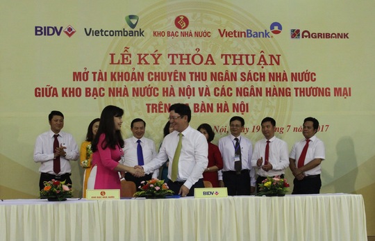 BIDV và Kho bạc Nhà nước ký kết Thỏa thuận phối hợp thu Ngân sách Nhà nước tại Hà Nội - Ảnh 1.