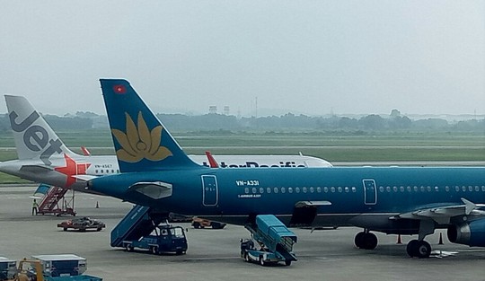 Vietnam Airlines không tăng giá vé máy bay Tết Mậu Tuất 2018 - Ảnh 1.