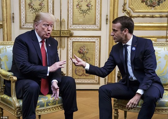 Giải mã phản ứng của ông Trump khi ông Macron vỗ đầu gối - Ảnh 10.