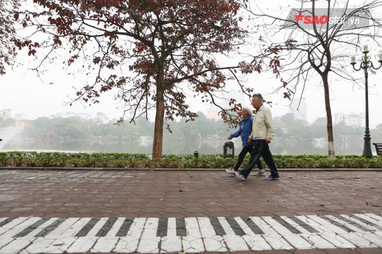 Không ồn ào vội vã, Sài Gòn - Hà Nội được trả lại vẻ yên bình trong ngày mùng 1 Tết - Ảnh 19.