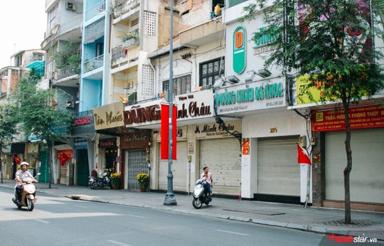 Không ồn ào vội vã, Sài Gòn - Hà Nội được trả lại vẻ yên bình trong ngày mùng 1 Tết - Ảnh 6.