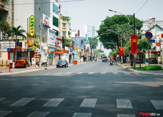 Không ồn ào vội vã, Sài Gòn - Hà Nội được trả lại vẻ yên bình trong ngày mùng 1 Tết - Ảnh 7.