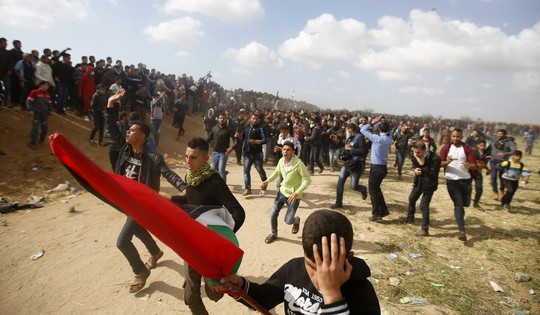 Ngày đẫm máu ở Gaza, Israel không ngần ngại bắn đạn thật - Ảnh 1.
