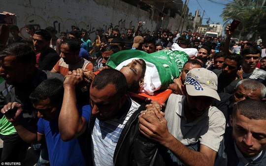 Ngày đẫm máu ở Gaza: Bé 8 tháng tuổi thiệt mạng vì khí cay - Ảnh 4.