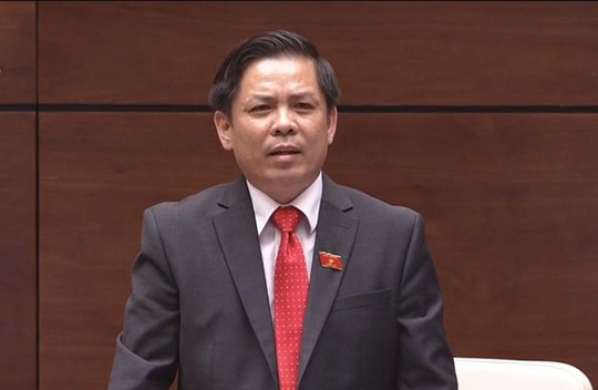 Bộ trưởng GTVT Nguyễn Văn Thể lần đầu ngồi ghế nóng trả lời chất vấn - Ảnh 1.
