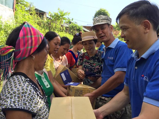 Ngân hàng Quốc Dân đùm bọc cộng đồng - Ảnh 1.