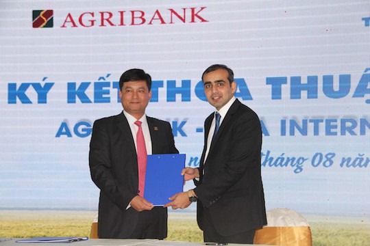 Agribank hỗ trợ tài chính giúp nông dân tiếp cận máy móc hiện đại - Ảnh 1.