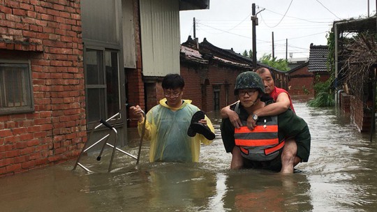 Trung Quốc cháy lớn, Đài Loan lụt sâu - Ảnh 7.