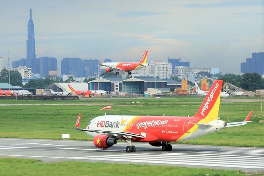 Đồng loạt mở 2 đường bay quốc tế Đà Nẵng - Singapore và Hồng Kông, Vietjet khuyến mãi “khủng” - Ảnh 1.