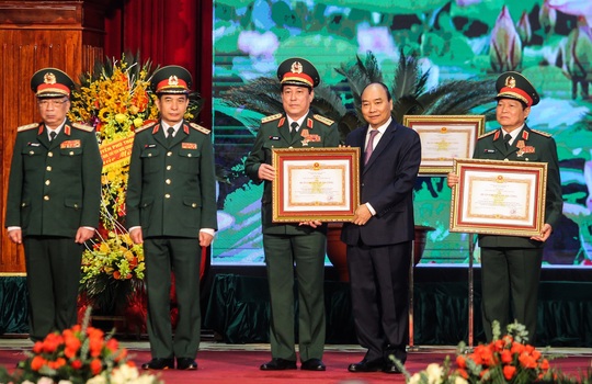 Quân đội Nhân dân Việt Nam nhận Huân chương Quân công hạng nhất - Ảnh 1.