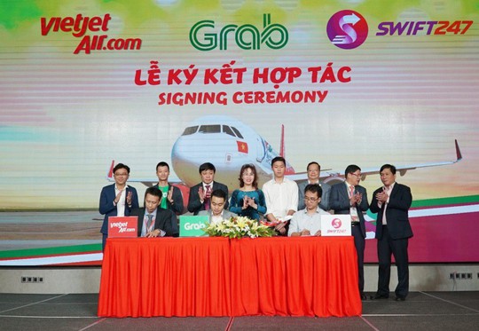 Vietjet, Swift247 và Grab hợp tác toàn diện - Ảnh 1.