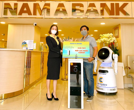 Nam A Bank trao giải ô tô trị giá 1,2 tỉ đồng cho khách hàng - Ảnh 4.