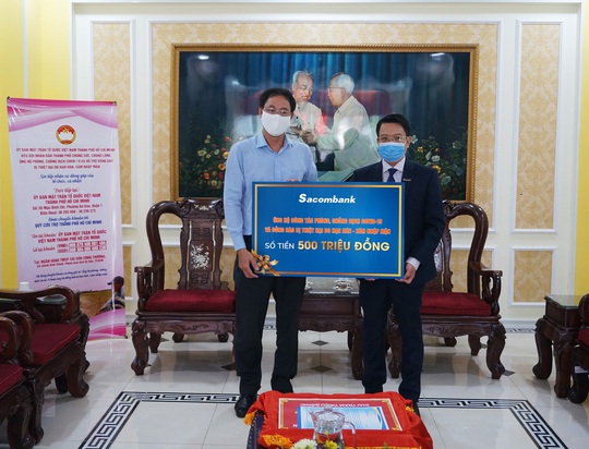 Sacombank đóng góp thêm 500 triệu đồng phòng chống dịch Covid-19, hỗ trợ thiên tai - Ảnh 1. Sacombank đóng góp thêm 500 triệu đồng phòng chống dịch Covid-19, hỗ trợ thiên tai - Ảnh 1.