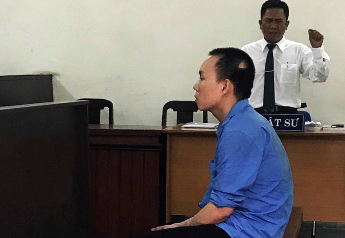 Kẻ nã súng cướp tiệm vàng ở quận Bình Tân lãnh 20 năm tù - Ảnh 1.