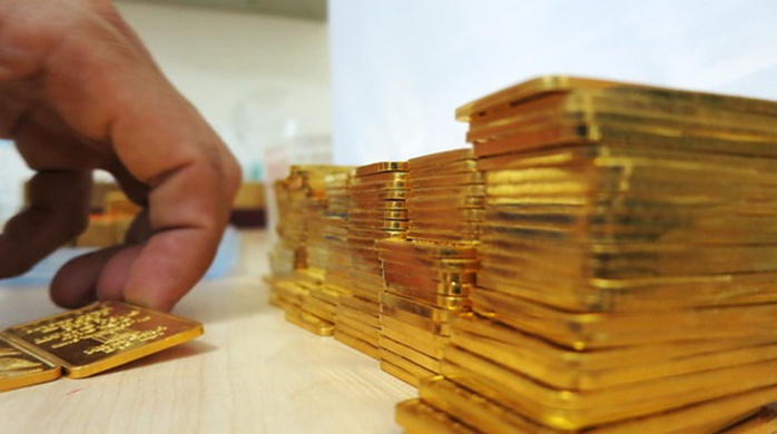 Giá vàng SJC nhảy vọt, hướng đến mốc 38 triệu đồng/lượng - Ảnh 1.