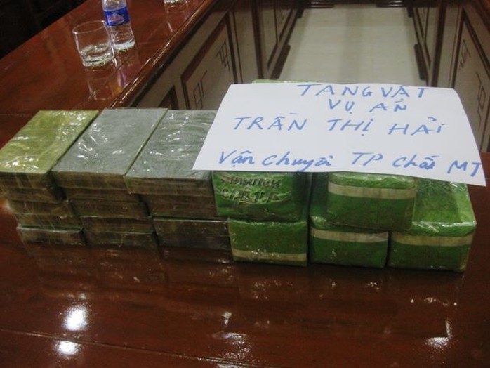 Chặn xe khách bắt người phụ nữ mang 15 bánh heroin, 5 kg ma túy đá - Ảnh 2.