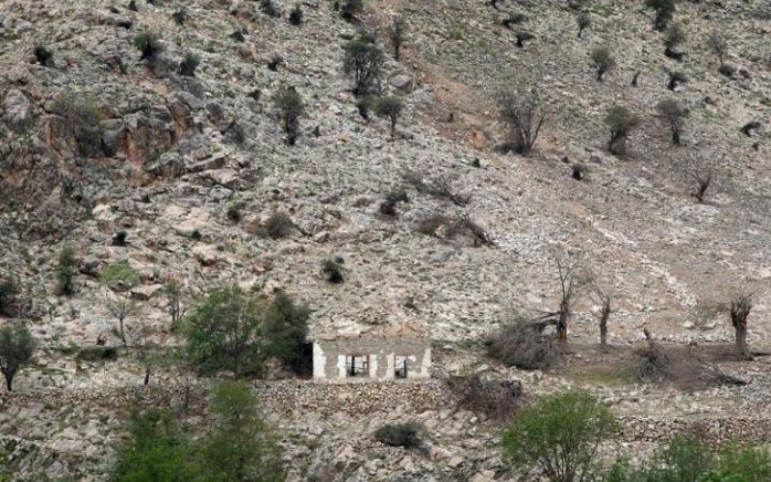 Hiện trường vụ siêu bom MOAB (ảnh dưới) nổ ở huyện Achin, tỉnh Nangarhar - Afghanistan Ảnh: REUTERS - DOD