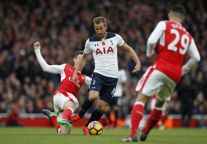 Arsenal hết chung mâm với Tottenham - Ảnh 1.