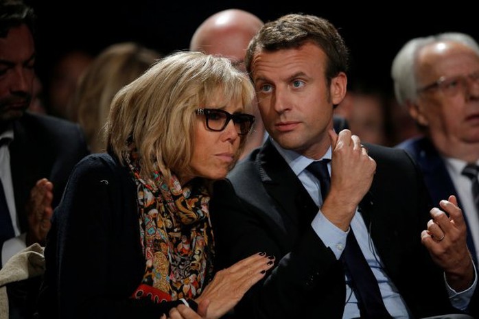 Ứng viên tổng thống Macron và vợ thường xuất hiện cùng nhau trong các sự kiện. Ảnh: Reuters