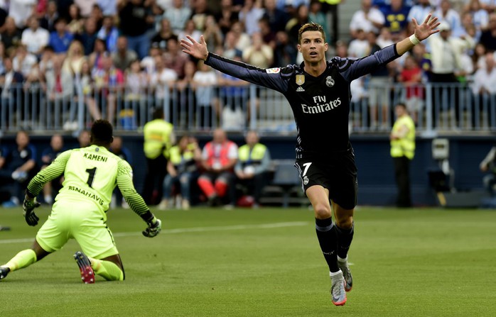 Ronaldo cân bằng kỷ lục hiếm của Messi - Ảnh 1.