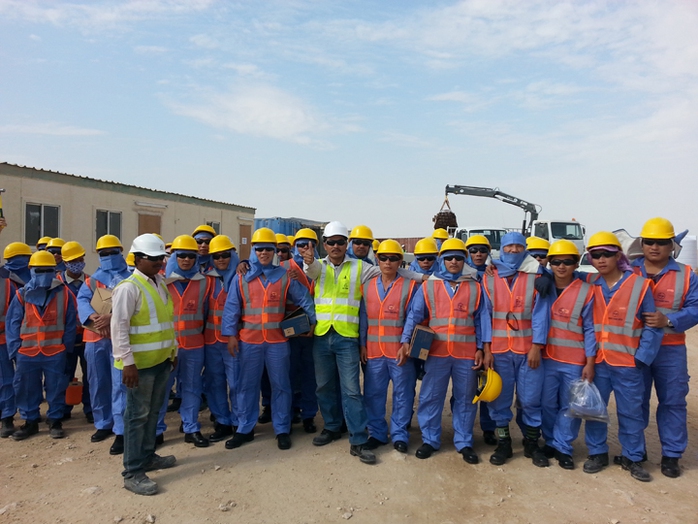 Lập đường dây nóng hỗ trợ lao động Việt Nam tại Qatar - Ảnh 1.