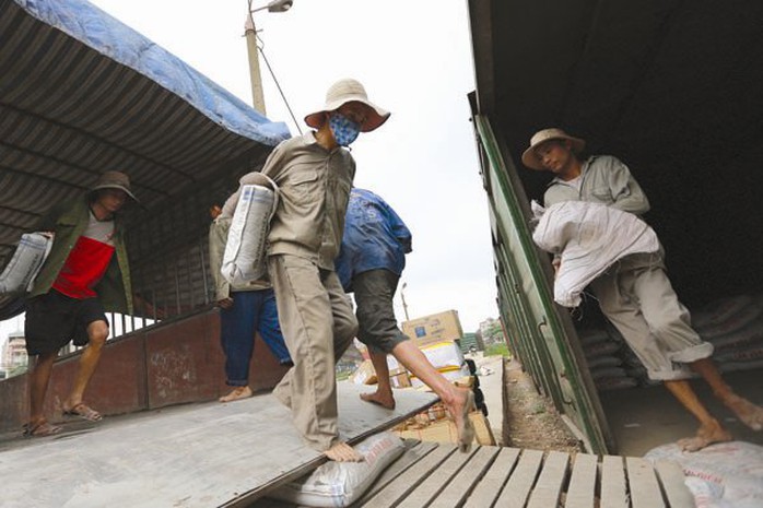 Một số lượng rất lớn người lao động tự do, lao động trong khu vực phi chính thức chưa được đảm bảo an sinh xã hội. Ảnh: NGUYỄN NAM