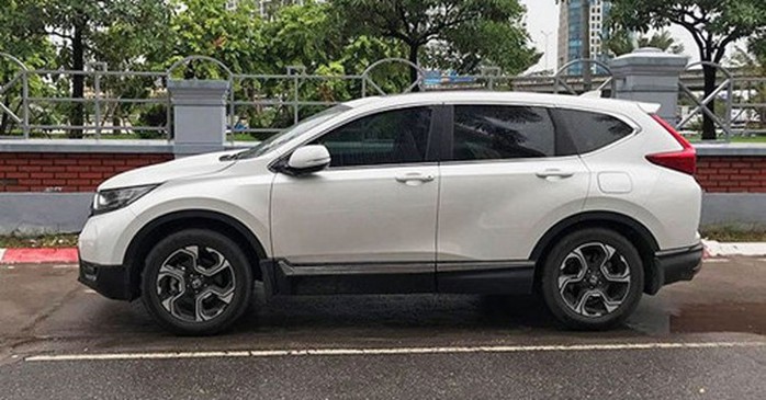 Nghịch lý ôtô cũ giá cao hơn xe mới niêm yết - Ảnh 1. Nghịch lý ôtô cũ giá cao hơn xe mới niêm yết - Ảnh 1.