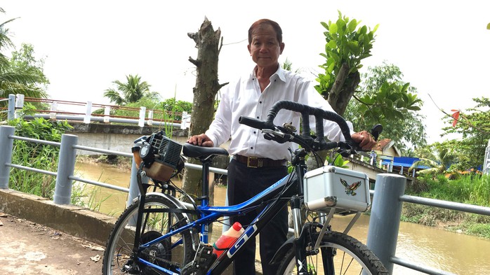 Lão nông chế tạo xe đạp chạy bằng máy cắt cỏ “độc nhất vô nhị” - Ảnh 3.