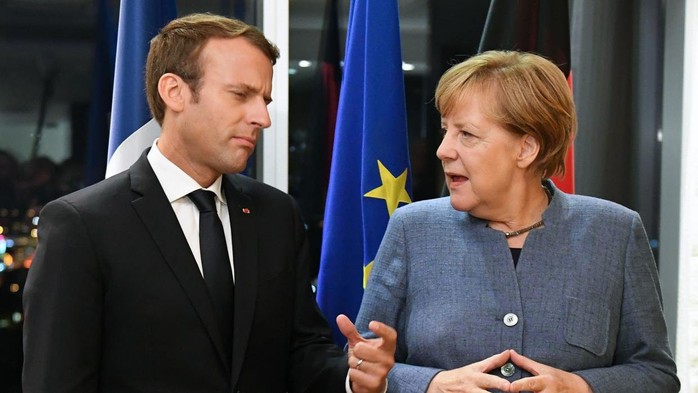 Nga vùi dập yêu cầu của bà Merkel và ông Macron - Ảnh 1.