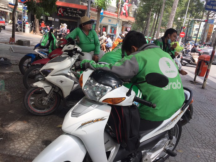 Grab nhờ công an điều tra nạn GrabBike giả chặt chém khách - Ảnh 1.